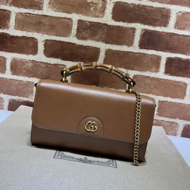 G*u*i top handle bags